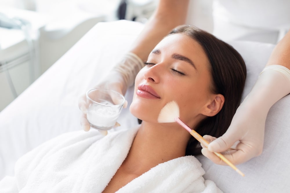 Cosmetologist,Cleaning,Face,Of,A,Beautiful,European,Woman,With,Special Chemical Peels Milledgeville GA