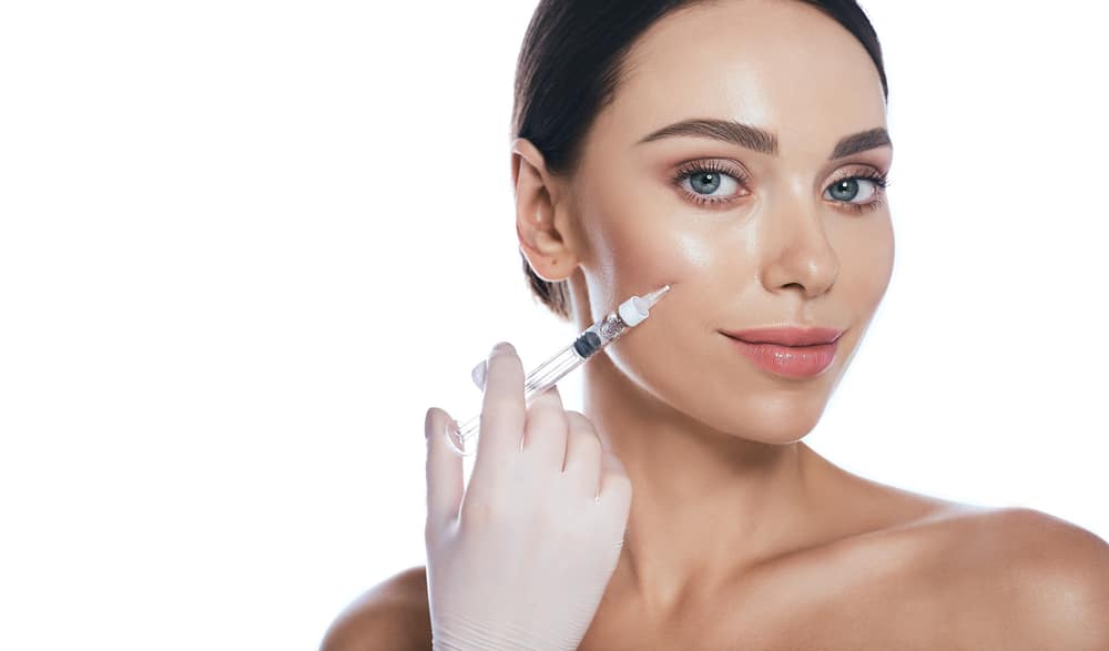 Beautician,Doing,Injections,Dermal,Fillers,Into,Female,Cheeks,For,A Dermal Filler Milledgeville GA