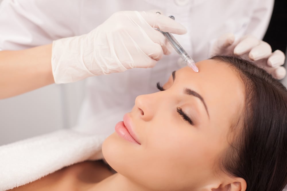 Close,Up,Of,Hands,Of,Expert,Beautician,Injecting,Botox,In Dysport Milledgeville GA